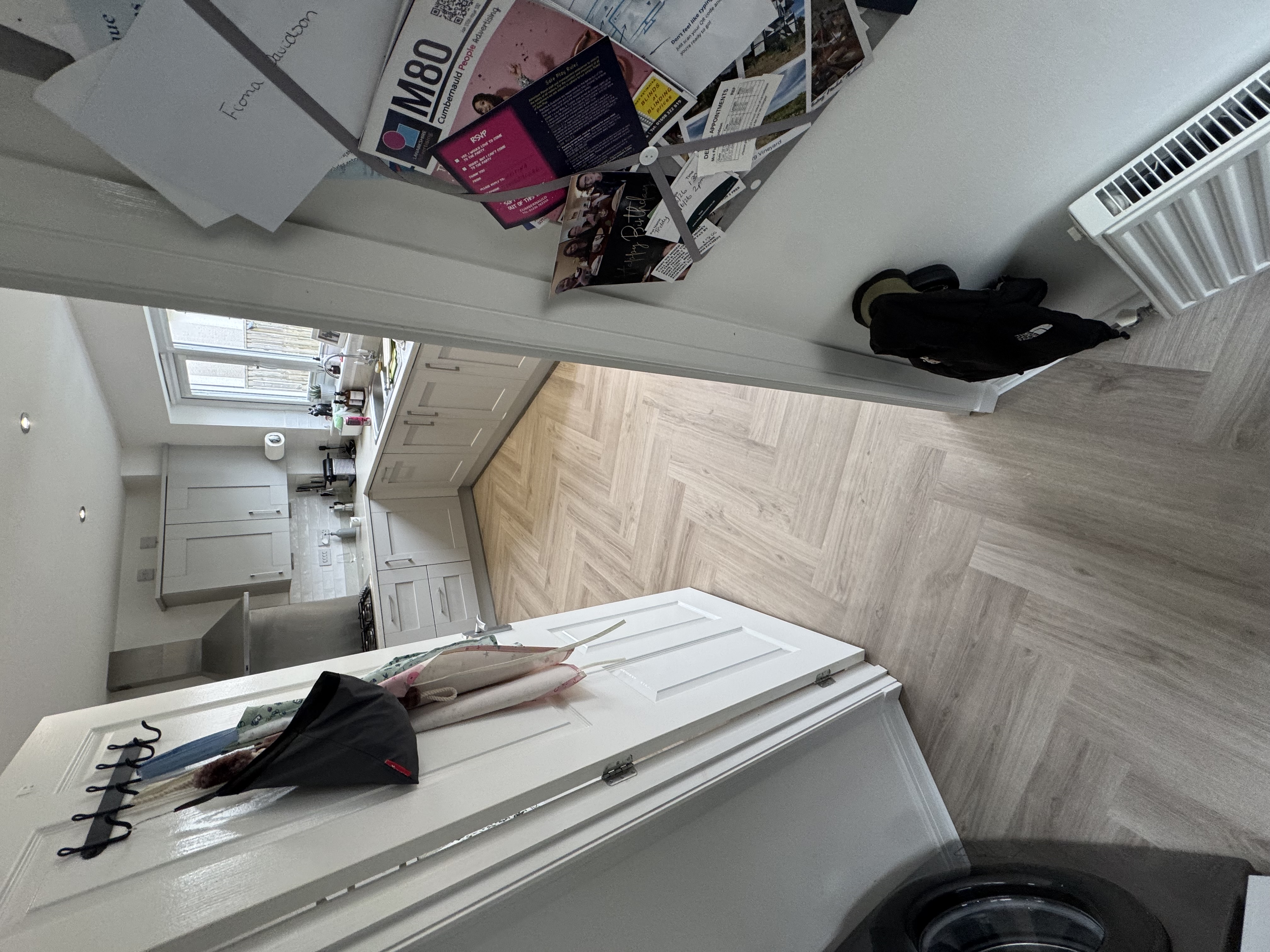 Herringbone flooring with white internal doors