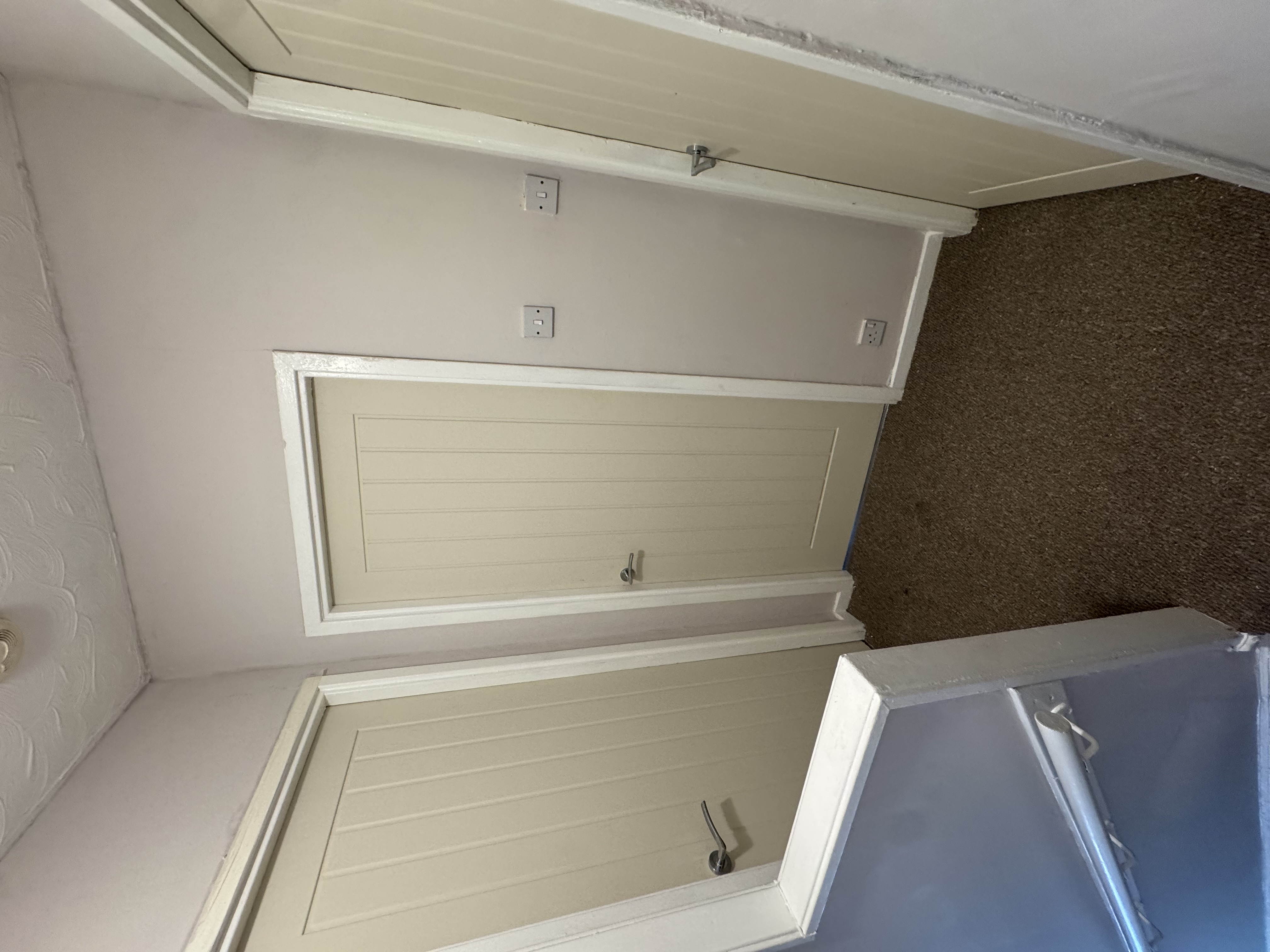 Bespoke painted built-in storage cupboards